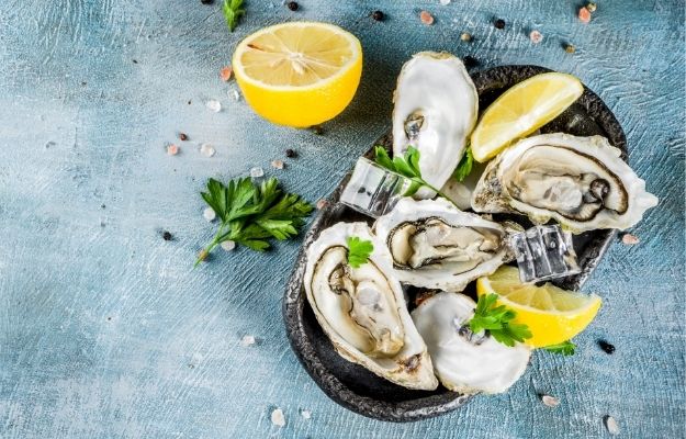 a dish of oysters and lime | Zinc | Key Nutrients For Sexual Energy