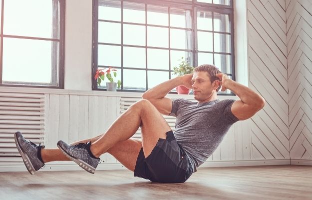 man is working out at home | Prevention | 5 Top Male Health Concerns and What You Can Do