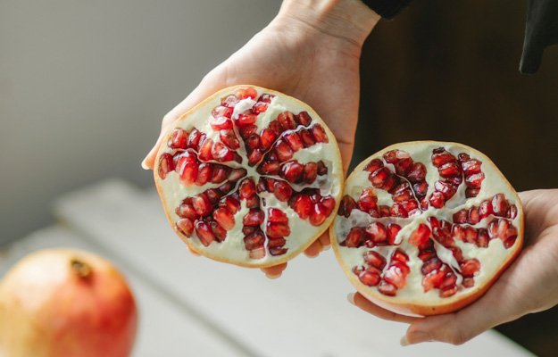 2 halves of pomegranates | Eat These 7 Foods To Boost Testosterone Naturally