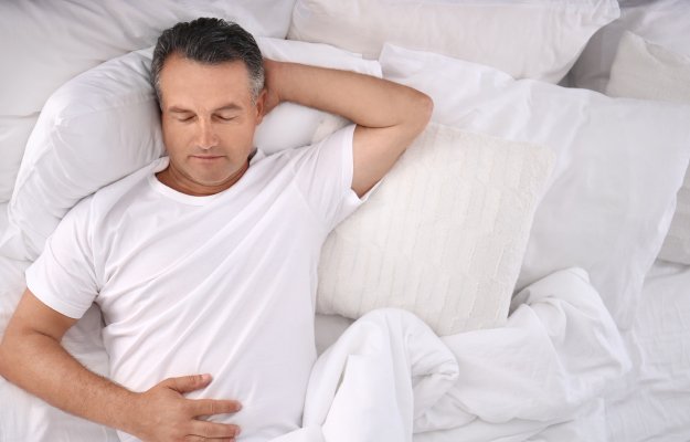 Man-sleeping-on-comfortable-pillow---------GET-ENOUGH-SLEEP_body | BLOG How To Balance Your Hormones | GET-ENOUGH-SLEEP