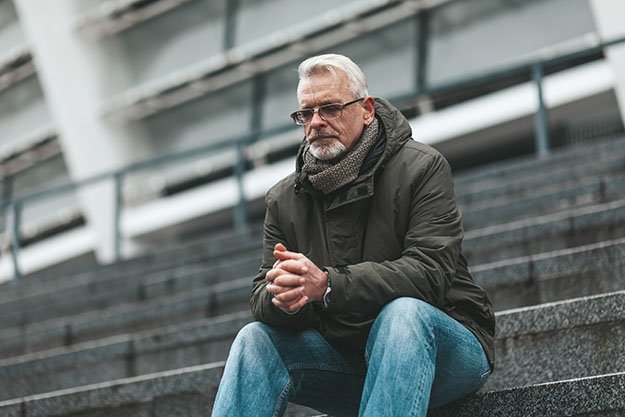 An-elderly-man-sits-outdoors-hoping-Andropause-Symptoms-ss-body | Are You At Risk Of Andropause? Tell-Tale Signs Of Male Menopause