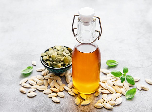 Bottle-with-pumpkin-seed-oil-Natural-DHT-Blockers | How Do DHT Blockers Work In Reversing Hair Loss?