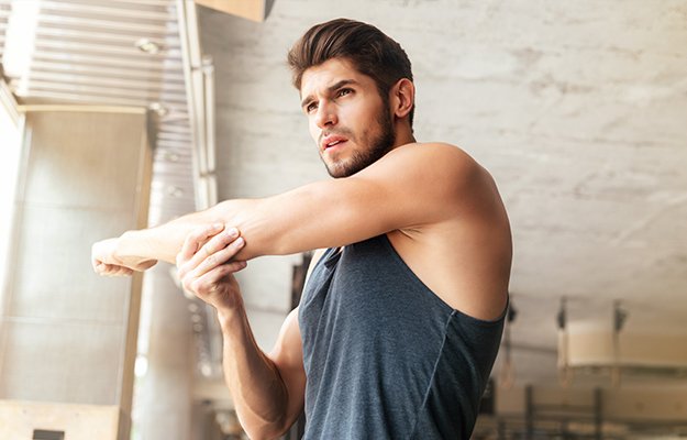 Fitness-man-warming-up-in-gym-ss-body | 10 Important Biomarkers To Optimize Your Health