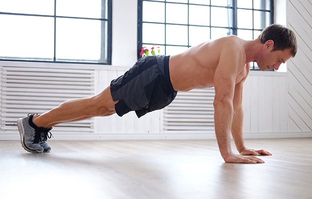 Push up middle aged man | How A Strong Immune System Could Be The Best Response To COVID-19 & Its Variants