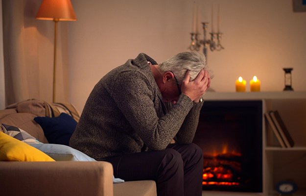 Senior man covering his head and having depression | 6 Reasons Why Men Lose Interest in Sex