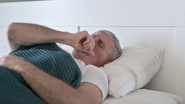Sick Middle Aged Man Coughing CLRD Causes