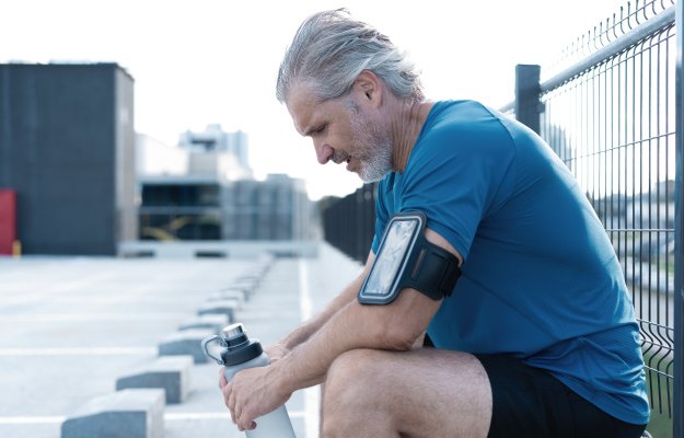 Tired Exhausted Middle aged Man Resting After Running Exhaustion Between Sets