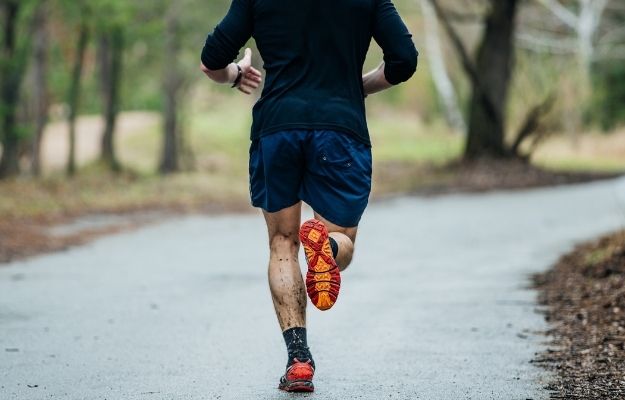 a man is having a running at park | Cardio and Strength Training | How to Decompress After a Long Day
