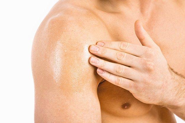 man applying testosterone gel-Topic Testosterone Gel | Hormone Replacement Therapy for Men: 4 Types Compared