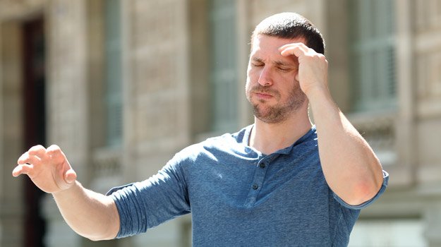 Man feeling dizzy weak