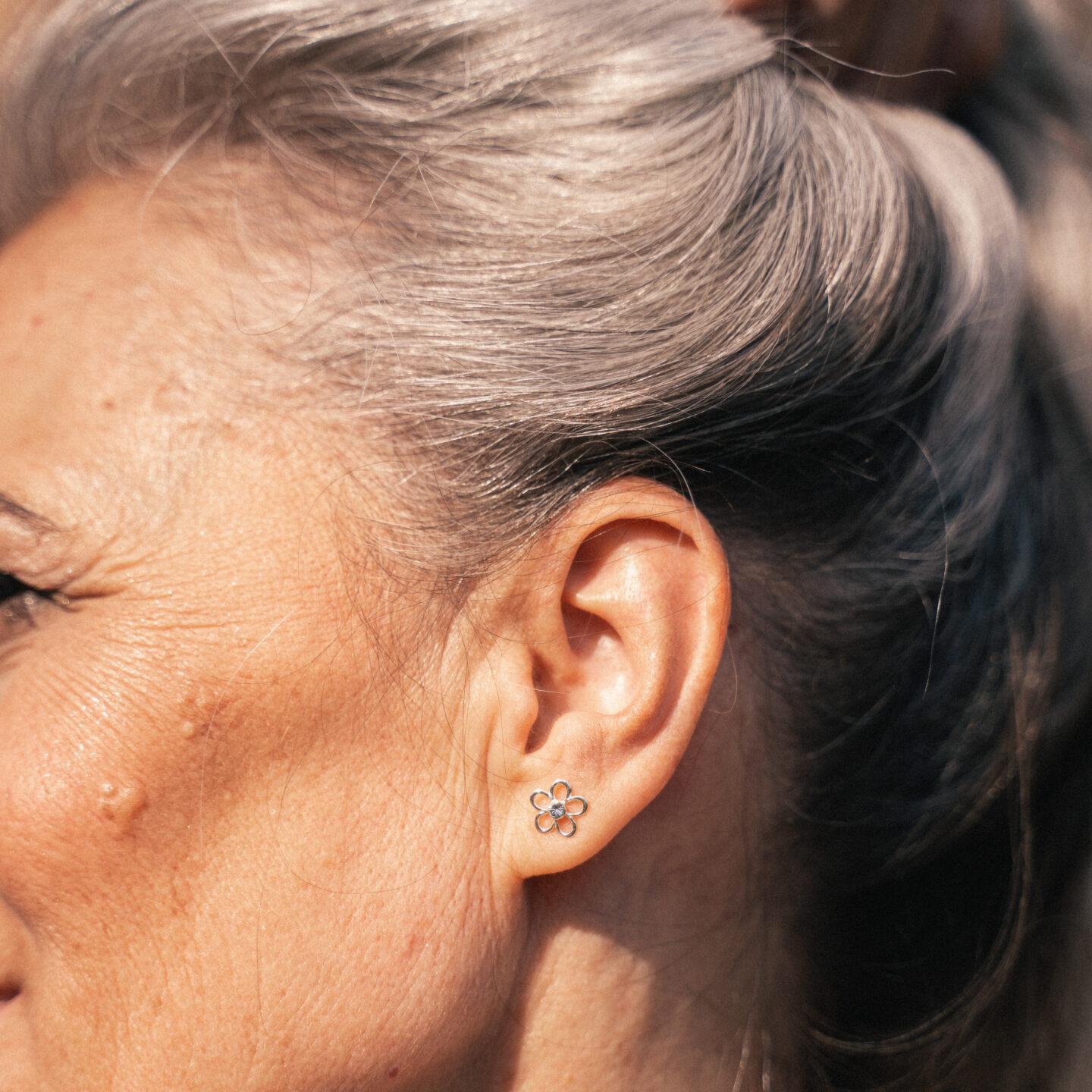 Woman considering factors affecting skin health