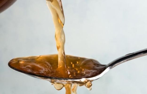 apple cinder vinegar poured into the spoon | Erectile Dysfunction Overview | Can Apple Cider Vinegar Help Treat Erectile Dysfunction?