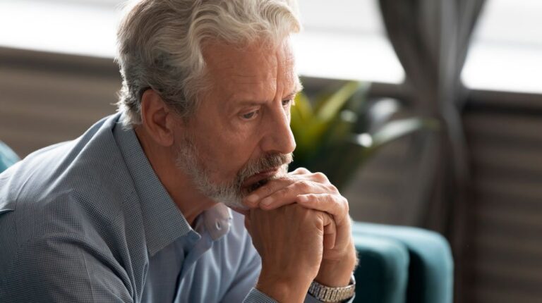 middle-aged-man-looking-absent-frustrated | Feature | What Causes Hypogonadism and How To Treat It