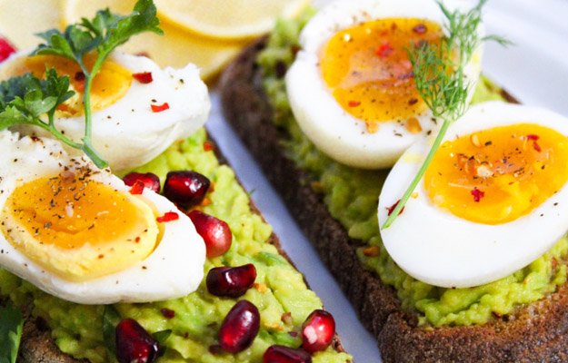 Boiled eggs on avocado toast | Eat These 7 Foods To Boost Testosterone Naturally