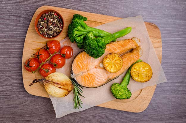 salmon steak with vegetables and spices-Excess Calcium-ss-body | 10 Worst Foods for Prostate Health and Foods You Need To Add To Your